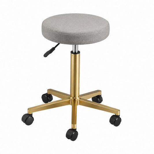 Tabouret de bureau réglable pivotant gris et doré en polyester avec base en acier 46 x 47-62 cm